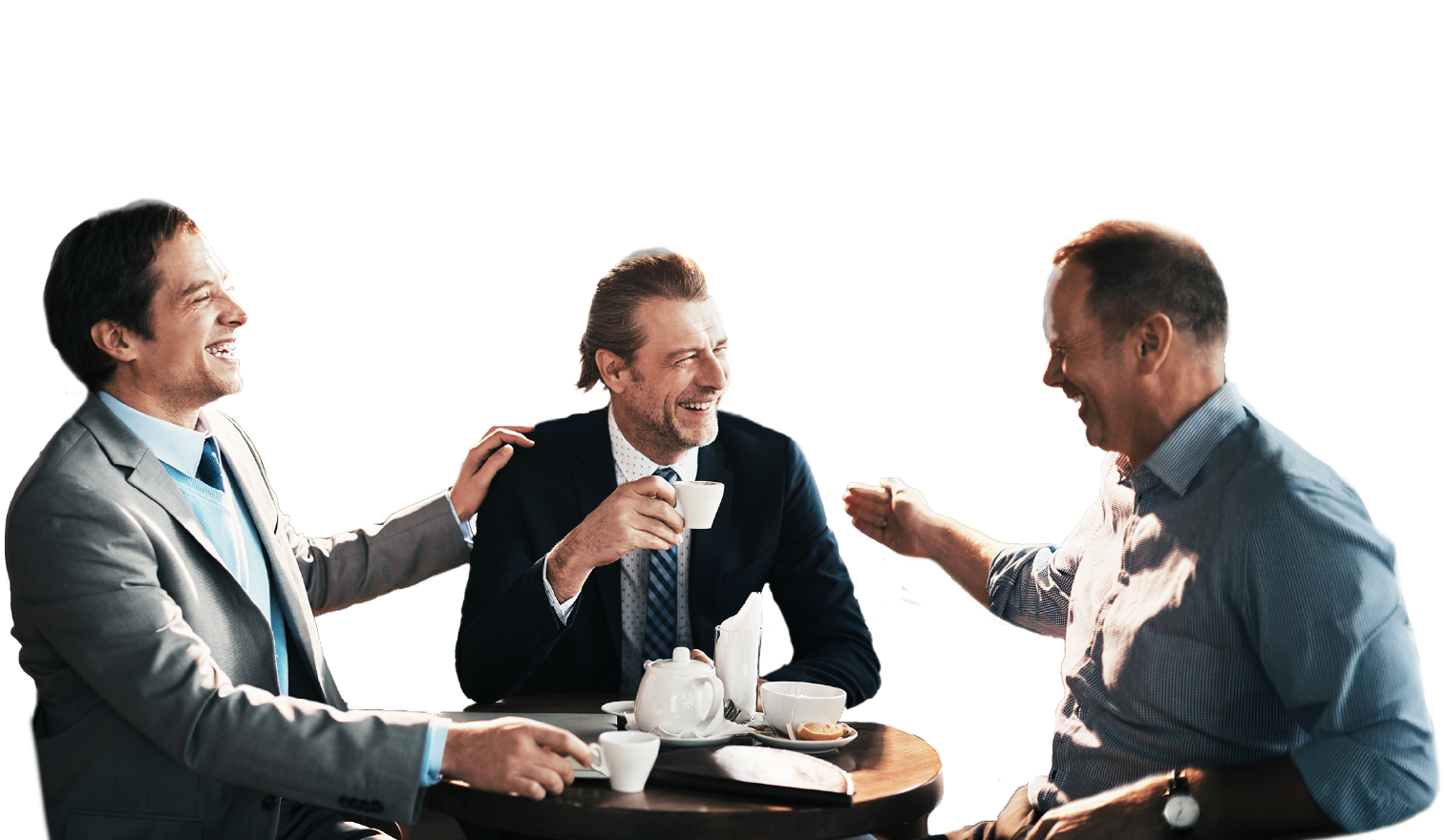Business professional men laughing while sipping coffee at a cafe